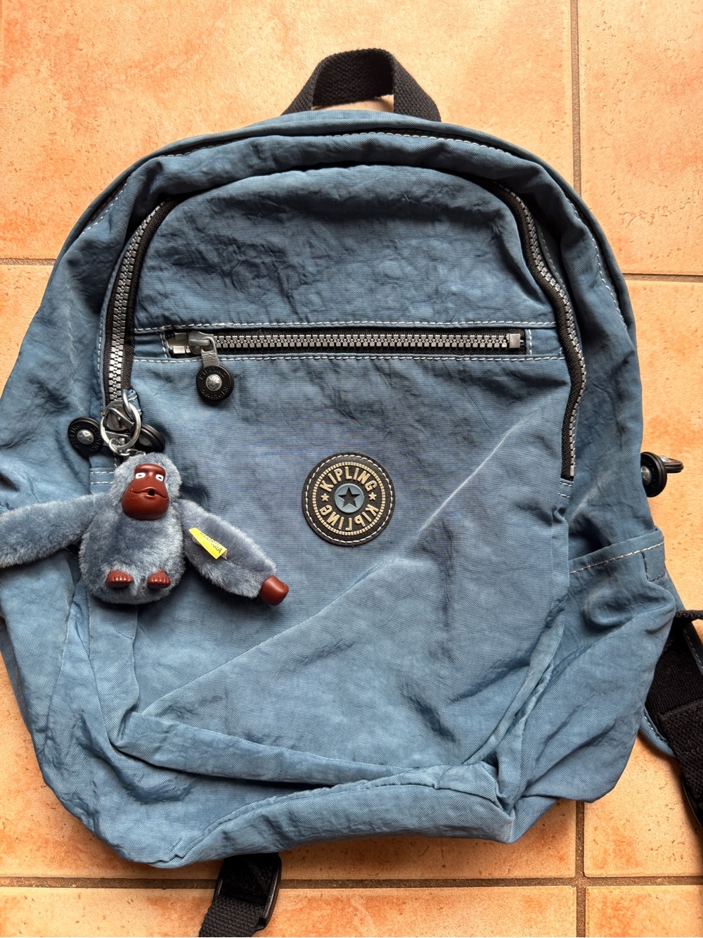 Kipling Dusty Blue Backpack with Monkey Keychain